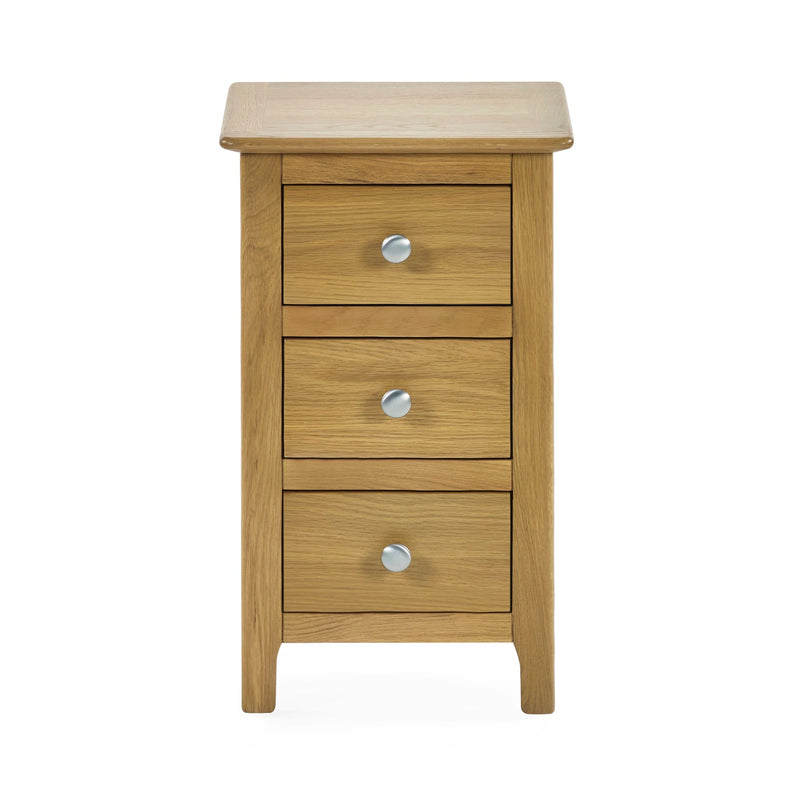 Wooden nightstand with three drawers and silver knobs on a white background