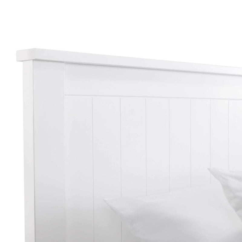 White wooden headboard with a subtle texture on a white background