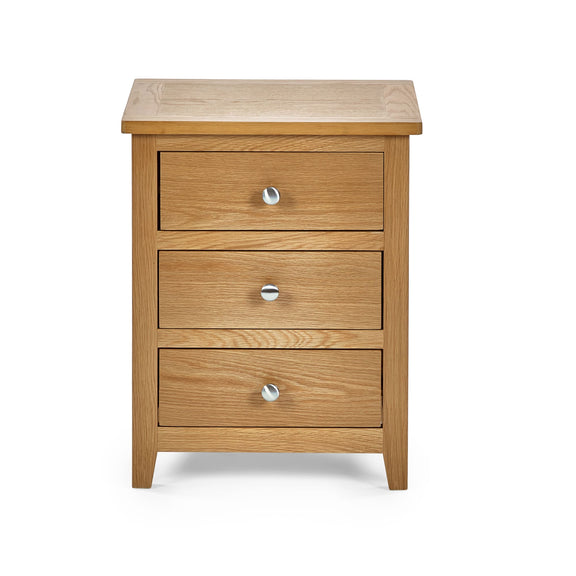 Wooden nightstand with three drawers on a white background
