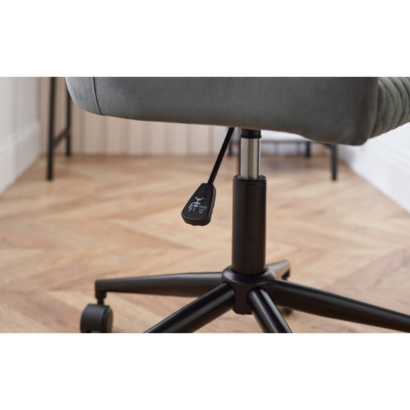 Gray office chair with black metal base on a wooden floor.
