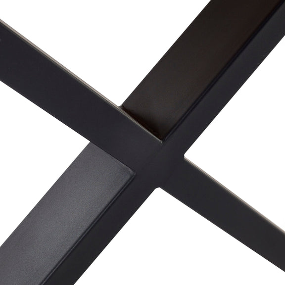 Close-up of a black metal crossbar on a white background