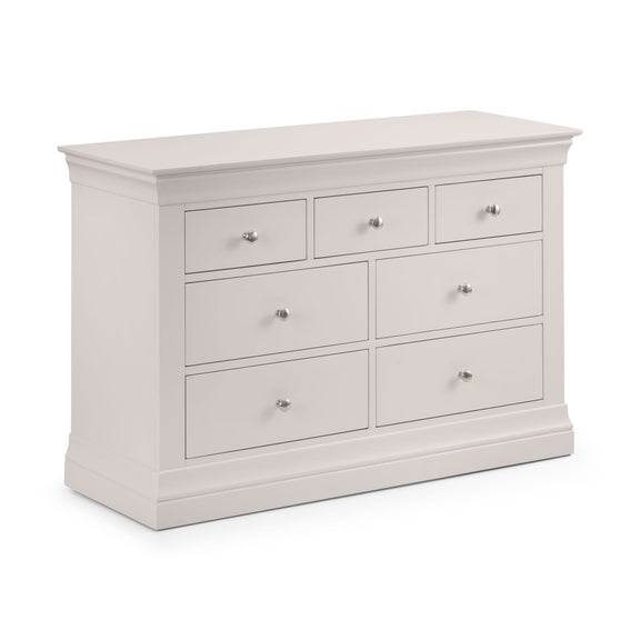 White dresser with multiple drawers on a white background