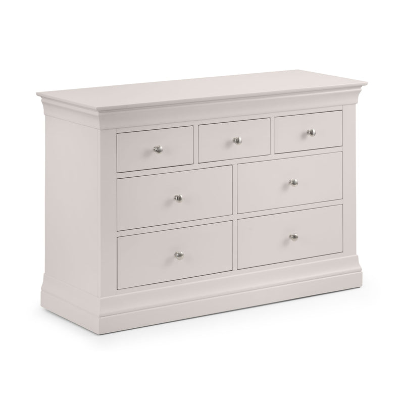 White dresser with multiple drawers on a white background