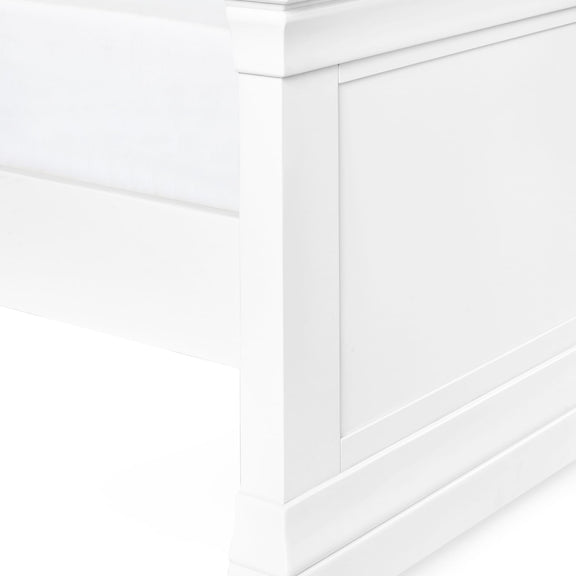Close-up of a white paneled wall with a geometric pattern