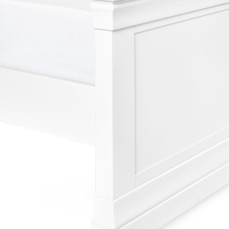 Close-up of a white paneled wall with a geometric pattern