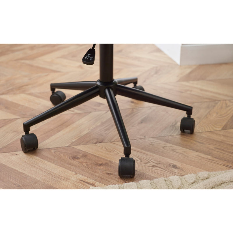 Black office chair base on a wooden floor