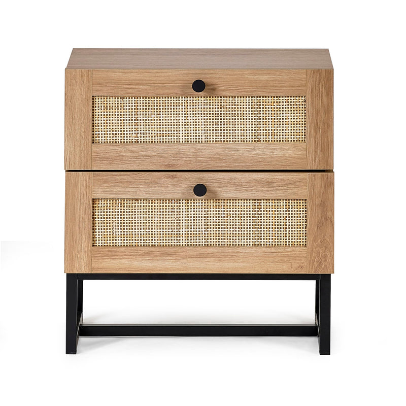 Wooden nightstand with two drawers and rattan front panels on a white background