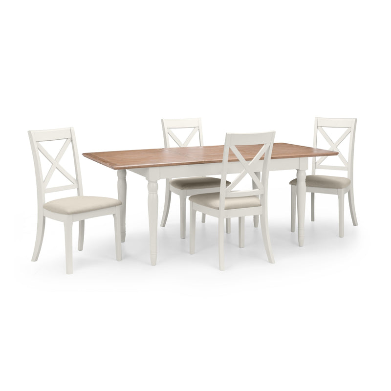 Dining table set with four chairs on a white background