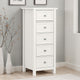 White dresser with four drawers in a room with gray walls and wooden flooring.