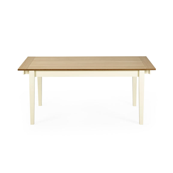 Wooden table with white legs on a white background