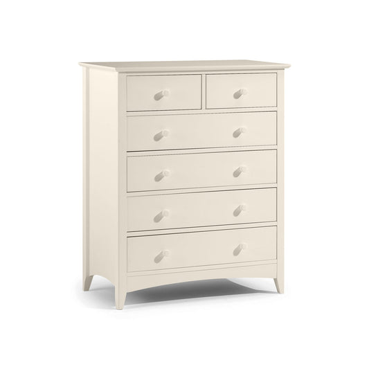 White dresser with multiple drawers on a white background
