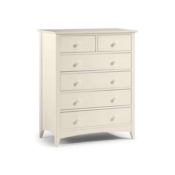 White dresser with multiple drawers on a white background
