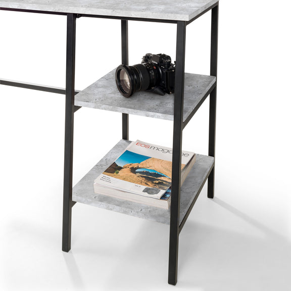 Two-tiered table with a camera and magazine on a white background