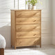 Wooden dresser with four drawers in a room setting