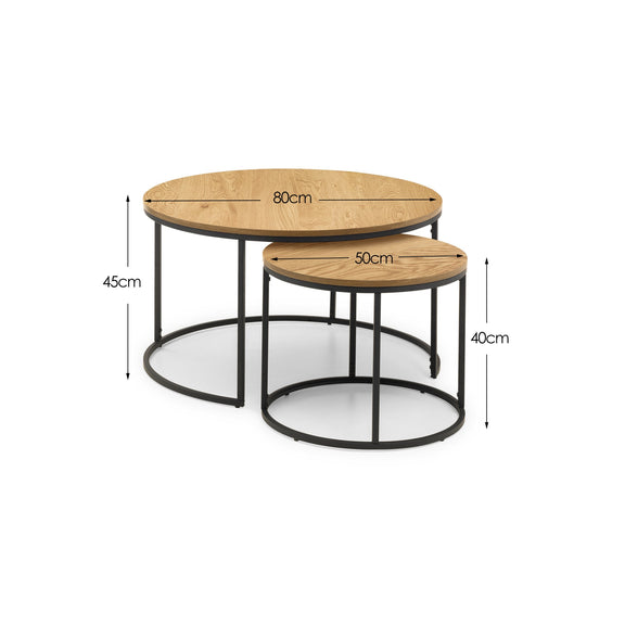 Two wooden nesting tables with measurements on a white background