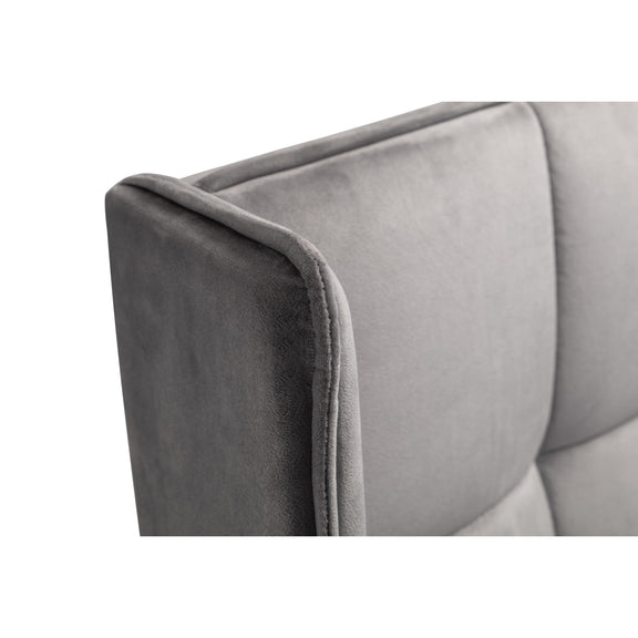 Gray upholstered headboard corner on a white background