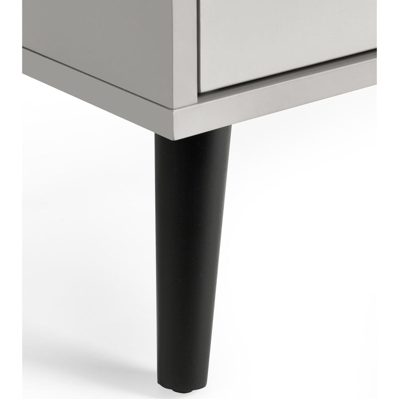 Close-up of a furniture leg on a white background