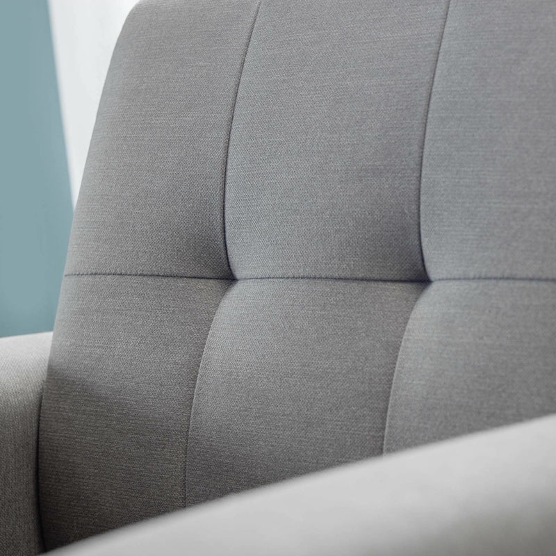 Close-up of a gray upholstered headboard