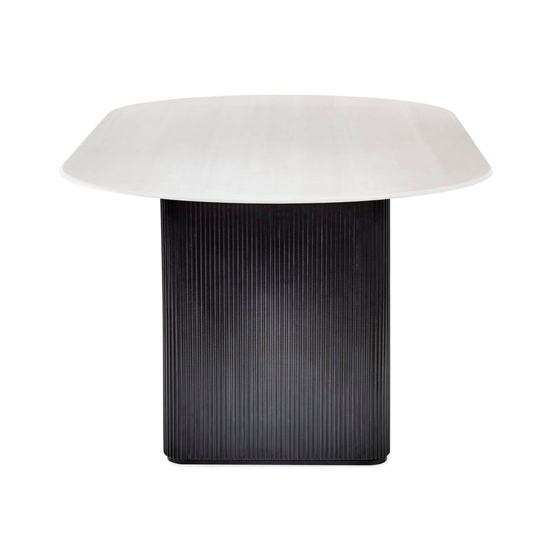 Modern side table with white top and black textured base on a white background
