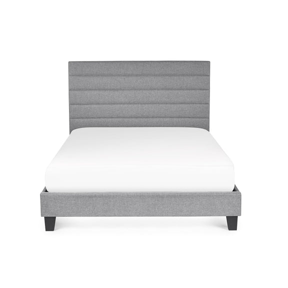 Gray upholstered bed with white mattress on a white background