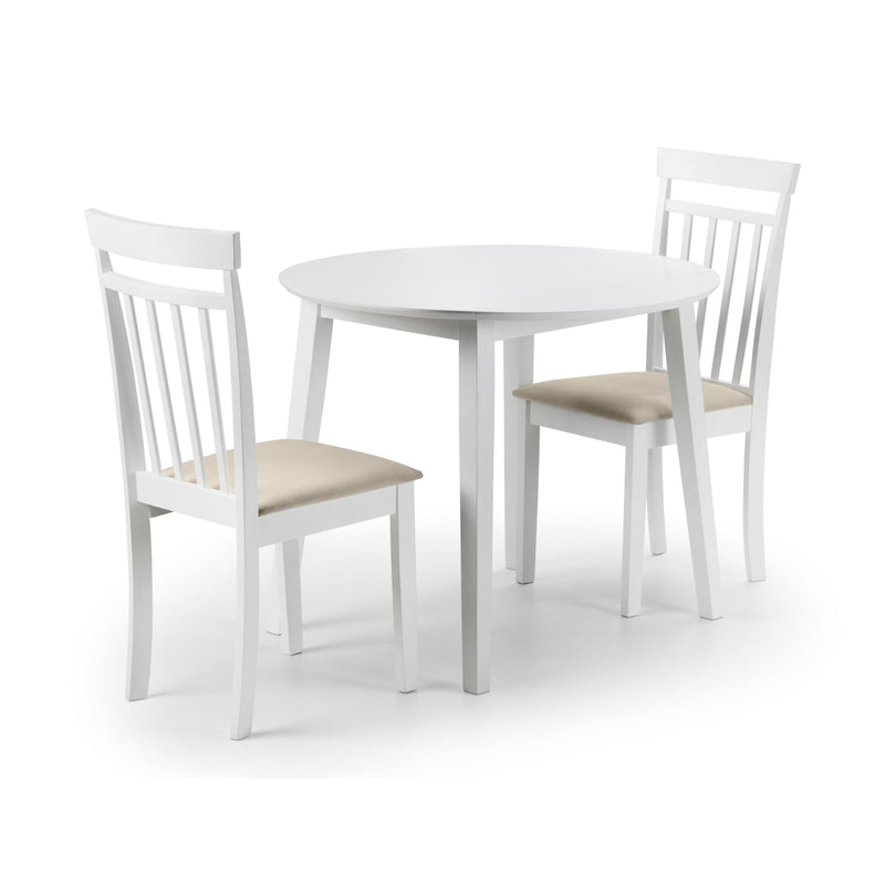 White round table with four matching chairs on a white background