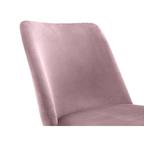 Pink velvet chair on a white background