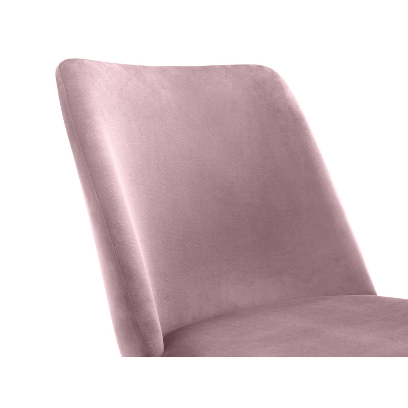 Pink velvet chair on a white background