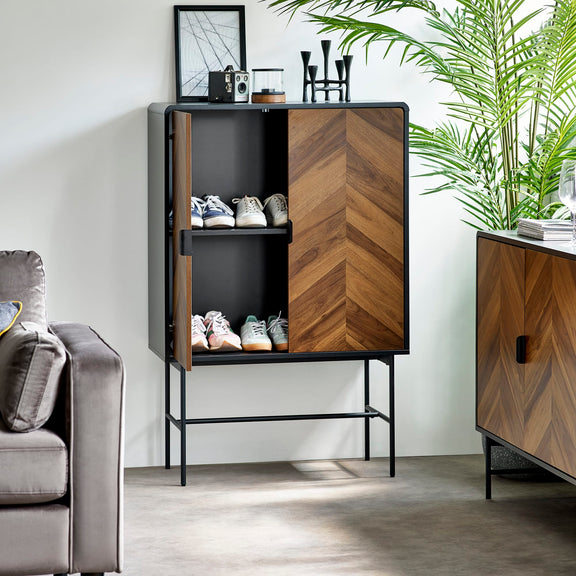 Wooden cabinet with shoe storage in a modern living room setting