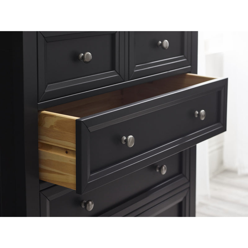 Black dresser with open drawer showing wooden interior