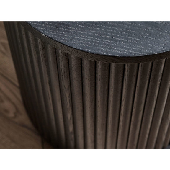 Round side table with ribbed wooden base and dark marble top