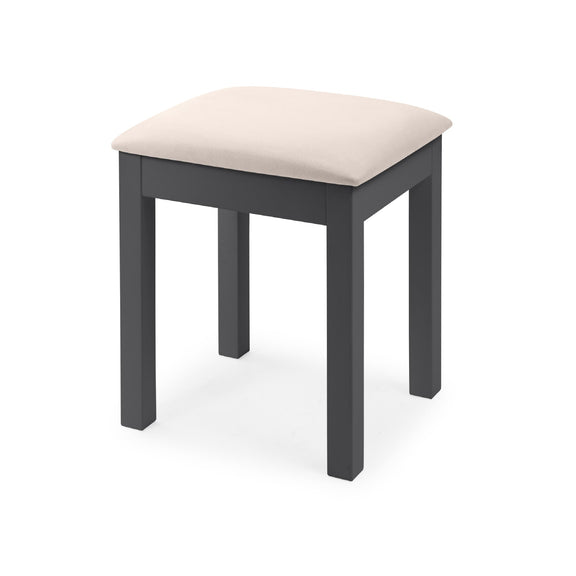 Stool with a beige cushion on a white background