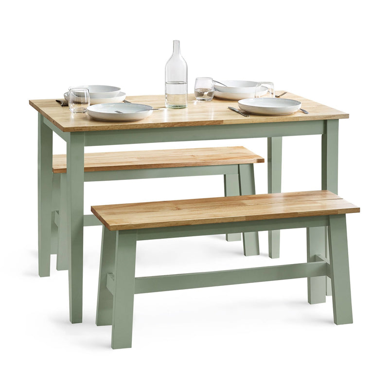 Dining table with two benches on a white background