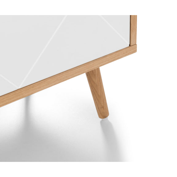 Close-up of a table with a white top and wooden legs on a white background
