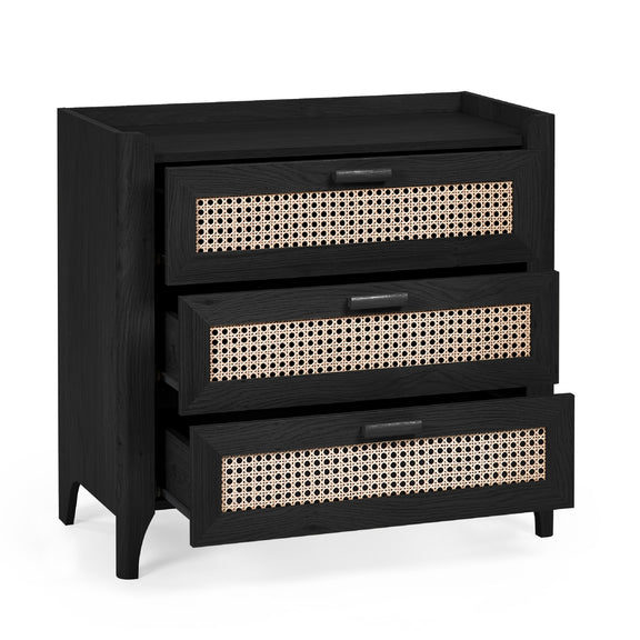 Black dresser with wicker-like drawer fronts on a white background