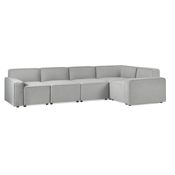 Gray sectional sofa on a white background
