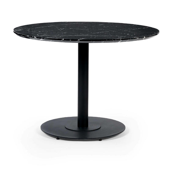 Black marble top table with a round base on a white background