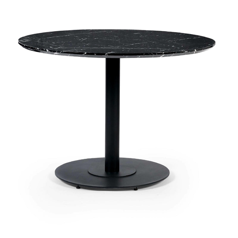 Black marble top table with a round base on a white background