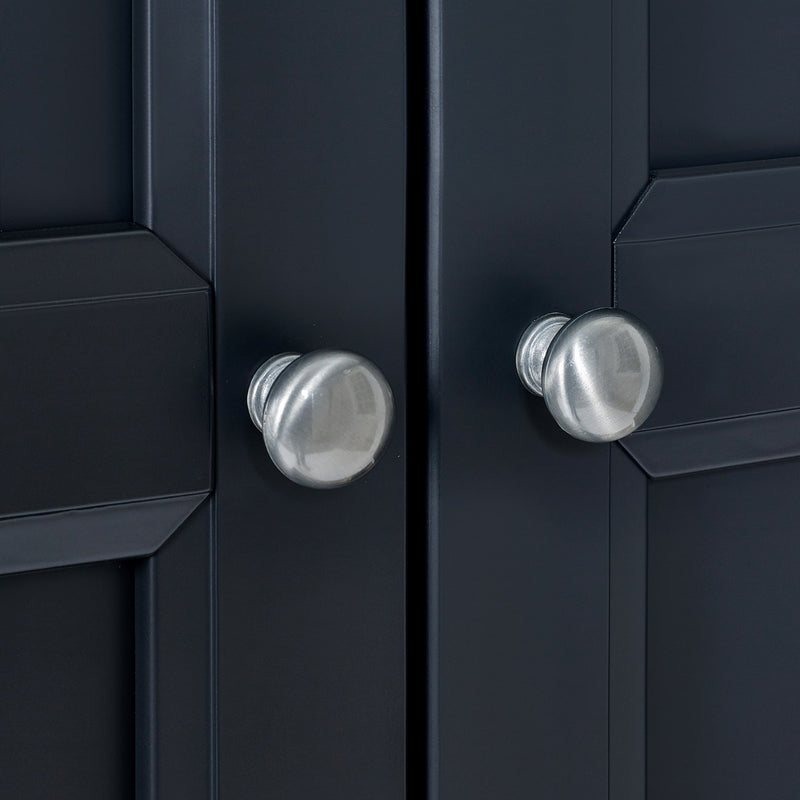 Close-up of black cabinet doors with silver knobs