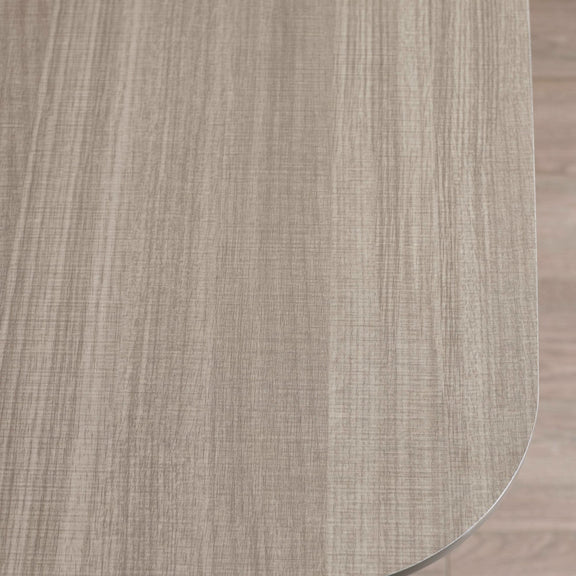 Close-up of a glass table with a wooden finish