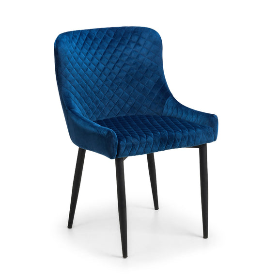Blue upholstered chair with black legs on a white background