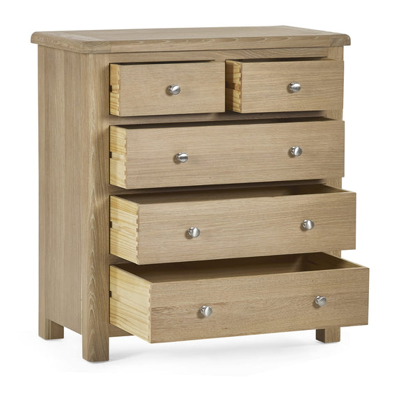 Wooden chest of drawers with five drawers on a white background