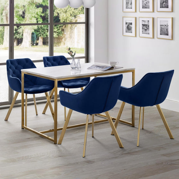 Dining room with a table and four blue chairs in a well-lit room.