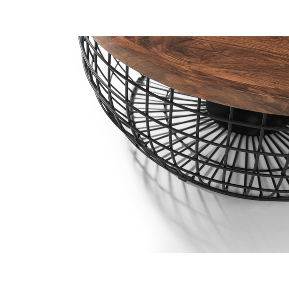 Wooden table with black metal base on a white background