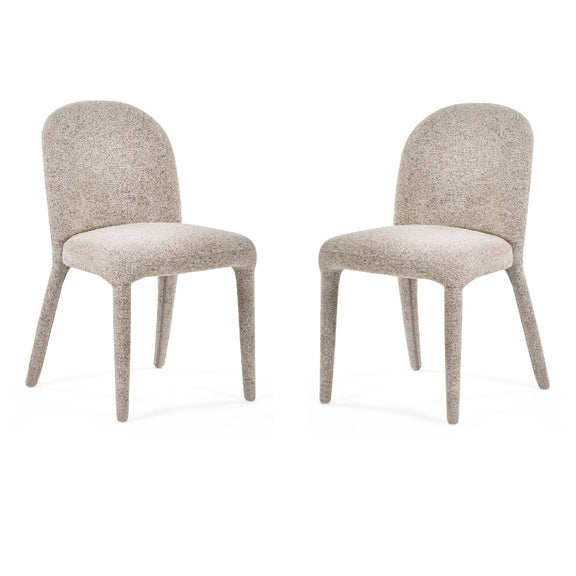 Two beige chairs on a white background