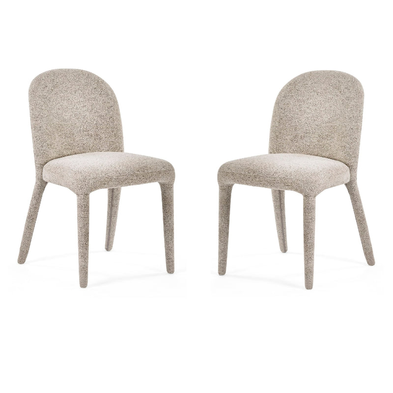 Two beige chairs on a white background