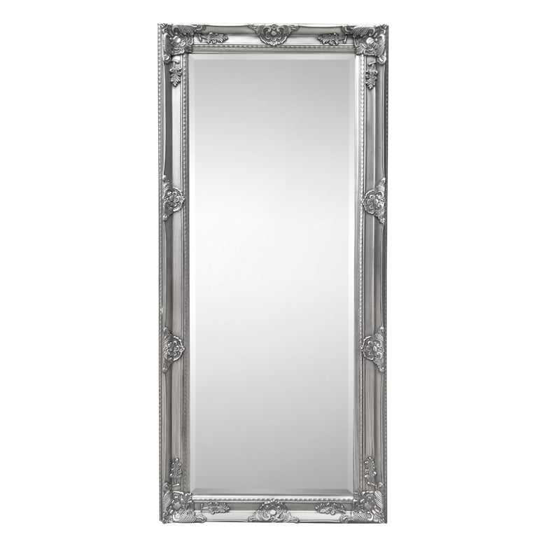 Decorative silver-framed mirror on a white background