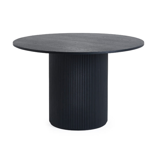 Round black table with ribbed cylindrical base on a white background