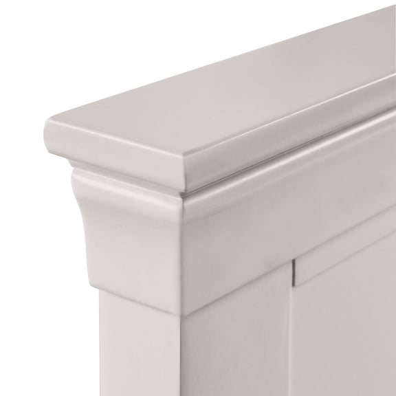 Close-up of a white wooden cabinet corner on a white background