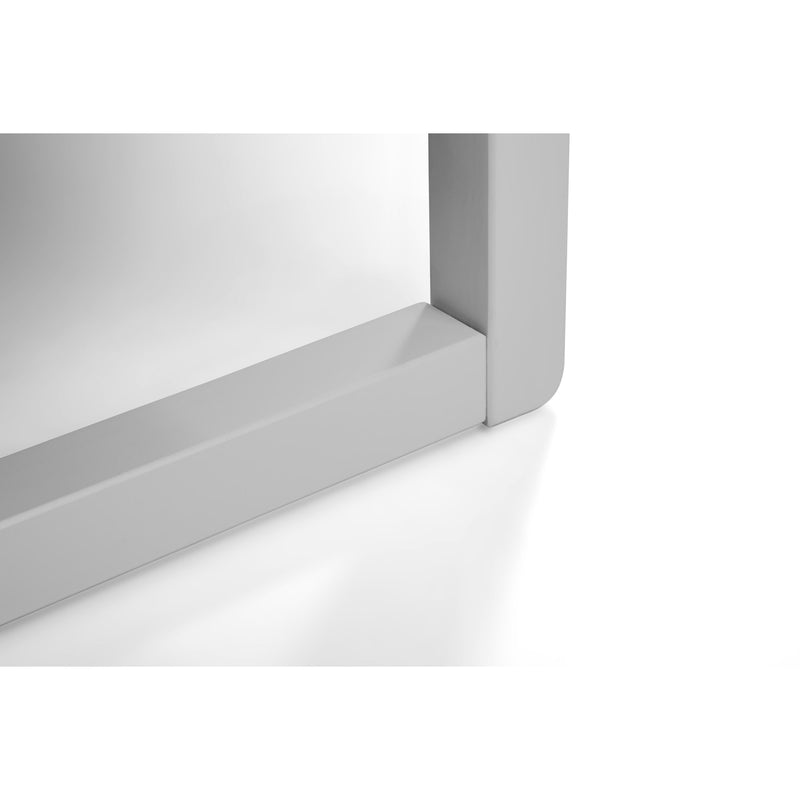 Close-up of a white rectangular object with a reflective surface on a white background