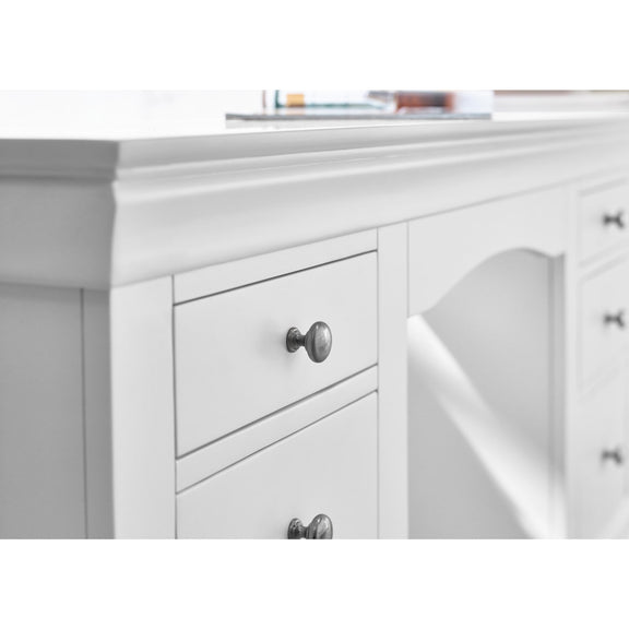 White bathroom vanity with mirror and drawers